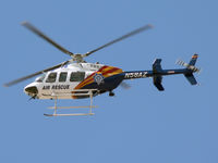 N58AZ @ PHX - Buzzing my house on a normally quiet Saturday morning - by John Meneely