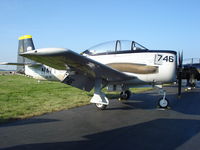 N746SH @ KOSH - North American T-28C - by Mark Pasqualino
