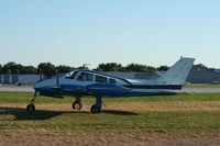 N5827X @ KOSH - Cessna 310 - by Mark Pasqualino