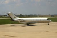 N700LK @ CID - Taxiing to Landmark FBO, as seen from my office window. - by Glenn E. Chatfield