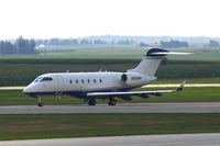 N228N @ CID - Taxiing to Runway 27 for departure. - by Glenn E. Chatfield