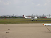 N5984G @ KILE - Cessna 150 taxiing to 19 for departure at Skylark. - by TorchBCT