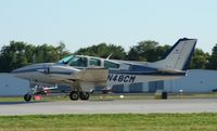 N48CM @ KOSH - Beech E55 - by Mark Pasqualino