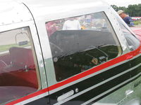 N64400 @ OSH - 1964 Piper PA-24-400 COMANCHE, Lycoming IO-720-A1A 8 cylinder 400 Hp, panel & red leather upholstery, cruise speed 213 mph, stall with flaps 68 mph. This Media Superstar is always an attraction. - by Doug Robertson
