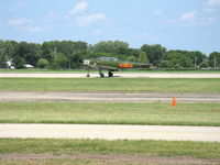 N147M @ OSH - Nanchang China CJ-6A, engine change to Vedeneev (Ivchenko) M-14 II 360 Hp, landing roll Rwy 36 - by Doug Robertson