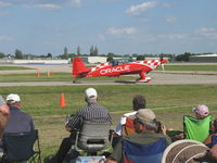 N772TA @ OSH - 2007 Extra Flugzeugbau Gmbh EA 300/L, Lycoming AEIO-540-L1B5 300 Hp, taxi - by Doug Robertson