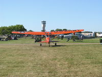 N90671 @ OSH - 1951 Cessna 305A BIRD DOG, Continental O-470, taxi - by Doug Robertson