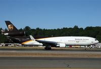 N271UP @ KBFI - UPS 84 arrives - by Nick Dean