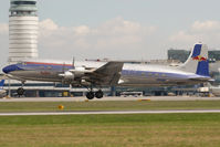 N996DM @ VIE - Red Bull DC6 - by Yakfreak - VAP