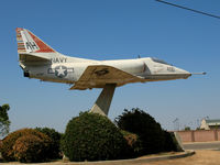 147727 - Pole-mounted A-4 in markings of VA-164 AH-400 USS oriskany - by Steve Nation