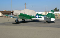 N49NA @ MIT - North American Texan G-AN under cover at Minter Field (Shafter, CA) ready for conversion to warbird - by Steve Nation