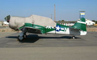 N49NA @ MIT - North American Texan G-AN under cover at Minter Field (Shafter, CA) ready for conversion to warbird - by Steve Nation