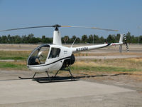 N313DA @ TLR - Helimark 2005 Robinson Helicopter R22 BETA 2 Tulare, CA - by Steve Nation