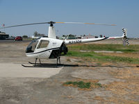 N313DA @ TLR - Helimark 2005 Robinson Helicopter R22 BETA 2 Tulare, CA - by Steve Nation
