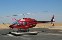 N828AC @ DLO - San Joaquin Helicopters 1975 Bell 206 at Delano, CA - by Steve Nation