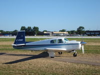 C-FRRR @ KOSH - Mooney M20C - by Mark Pasqualino