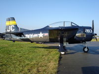 N828JC @ KOSH - North American T-28B - by Mark Pasqualino