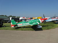N821MG @ OSH - 2006 Extra Flugzeugbau Gmbh EA 300SHP, Lycoming AEIO-580-X Thunderbolt Reno engine 350 Hp, Experimental class of 2006-2007 Team Lycoming aerobatic sponsorship - by Doug Robertson