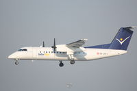 OE-LIE @ LOWW - Dash 8 landing RWY16