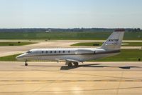 N357QS @ CID - Taxiing to Runway 27 for departure. - by Glenn E. Chatfield