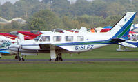 G-BLFZ @ EGSX - Piper Navajo at North Weald - by Terry Fletcher