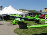 N262MX @ OSH - MX Aircraft MX2 'HOODOO', Lycoming AEIO-540, 3 blade prop, extreme aerobatic carbon fiber tandem two place, +/-12 g, roll rate 420 deg./sec. 45 degree seatbacks by Oregon Aero - by Doug Robertson