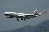 B-18801 @ VHHH - China Airlines arriving on runway 25R - by Michel Teiten ( www.mablehome.com )