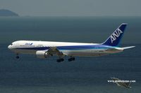 JA8356 @ VHHH - ANA in final approach to runway 25R - by Michel Teiten ( www.mablehome.com )