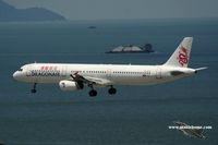 B-HTD @ VHHH - Dragonair approaching runway 25R - by Michel Teiten ( www.mablehome.com )