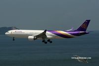 HS-TEH @ VHHH - Thai Airways approaching runway 25R - by Michel Teiten ( www.mablehome.com )