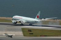 C-FIUJ @ VHHH - Air Canada touching down on 25R - by Michel Teiten ( www.mablehome.com )