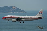 B-2206 @ VHHH - China Eastern Airlines approaching runway 25R - by Michel Teiten ( www.mablehome.com )