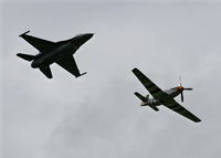 91-0387 @ YIP - F-16 with P-51 heritage flight - by Florida Metal