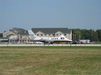 N712KM @ OSH - 1977 Cessna CITATION 500, two P&W JT15D-1A turbofans 2,200 lb st for takeoff each, takeoff roll Rwy 09 - by Doug Robertson