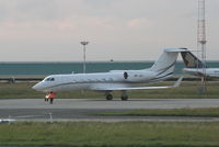 HB-JGJ @ EBBR - Arriving to G.A. apron at dusk - by Daniel Vanderauwera