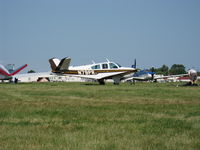 N79PR @ OSH - 1970 Beech V35B BONANZA, Continental IO-550-B 285 Hp, taxi - by Doug Robertson