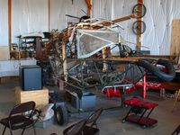 UNKNOWN @ I74 - Stripped down Fairchild 24 at Urbana, Ohio. - by Bob Simmermon