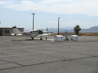 N2111Q @ EED - 1969 Beech 36 BONANZA, Continental IO-550 300 Hp upgrade, pit stop only on a very hot day - by Doug Robertson