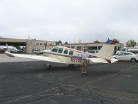 N2111Q @ ABQ - 1969 Beech 36 BONANZA, Continental IO-550 300 Hp upgrade, Atlantic Aviation's ramp-John at the plane - by Doug Robertson
