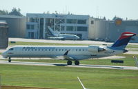 N607SK @ CYVR - Delta Connection - Taxiing - by David Burrell