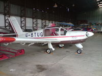 G-BTUG @ EGBS - Shobden Airfield hanger - by G E Elston