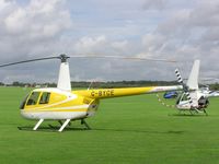 G-BYCE @ EGBK - R44 at Sywell - by Simon Palmer