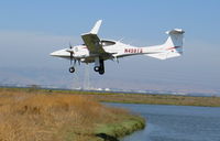 N459TS @ PAO - 2007 Diamond Aircraft Ind Inc DA 42 landing @ Palo Alto, CA - by Steve Nation