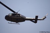 N354HF @ NKT - Love that sound of the Huey's rotors.
