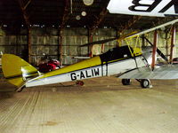 G-ALIW @ EGSP - inside the main hangar at Sibson - by Chris Hall