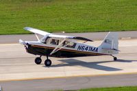 N641MA @ CID - Taxiing to the Landmark ramp after landing runway 9 - by Glenn E. Chatfield