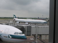 B-HXG @ RCTP - A340 at gate in Taipei - by John J. Boling