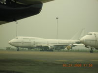 HS-UTO @ WIII - B-747 on Garuda maintenance ramp at Jakarta - by John J. Boling