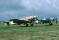 G-USTV @ EGSU - 1995 brought a rare sight to Duxford: two airworthy Daimler-Benz powered Bf-109's. G-USTV is an original Bf-109G; D-FDME is a converted Spanish Air Force Ha1112-M1L. - by Joop de Groot