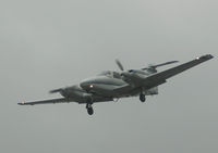 N856ND @ S50 - in flight, seconds from landing - by Wolf Kotenberg